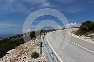 Serpentine road ascending to a mountain.