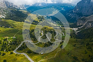 Serpentine road of Gardena pass. Italian Alps. Dolomiti, Dolomites, South Tyrol, Italy, UNESCO World Heritage. Aerial