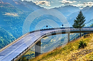 Serpentine road to the St. Gotthard Pass in the Swiss Alps photo