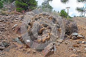 Serpentinized harzburgite on the walking trail on Mount Olympus, the highest point in Cyprus photo