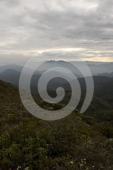 Serra fina mountain range with clouds in the winter of minas gerais brazil vertical photo