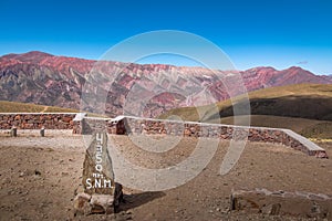 Serrania de Hornocal, the fourteen colors hill and altitude sign at Quebrada de Humahuaca - Humahuaca, Jujuy, Argentina