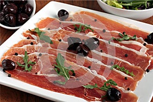 Serrano Ham with Black Olives photo