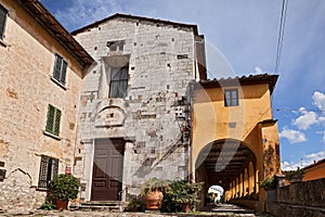 Serravalle Pistoiese, Pistoia, Tuscany, Italy: the medieval church of San Michele Arcangelo and the 17th century portico in the photo