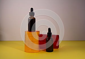 Serum bottles on the transparent podium