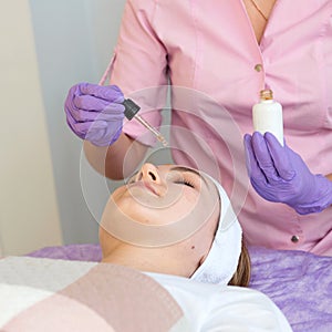 serum cream massage workflow in a beauty salon, close-up