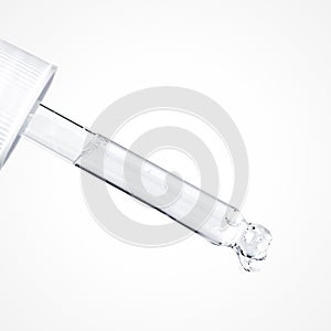 Serum or medicine pipet dropper isolated on white background