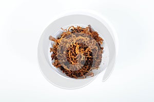 Serunding daging or spiced beef in bowl from top angle photo