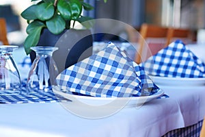 served and decorated round festive table in a restaurant