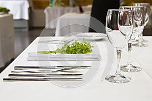 Served dinner table in a restaurant. Restaurant interior