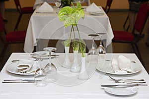 Served dinner table in a restaurant. Restaurant interior