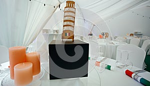 Served table with Italy topic decorated by flags and leaning tower of pisa