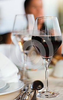 The served table with red wine at restaurant