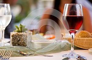 The served table with red wine at restaurant