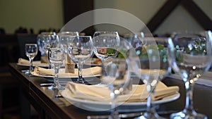 Served table in a restaurant for dinner, lunch or celebration.