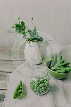 Served table with vases with flowers