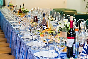 Served tables at the Banquet. Drink, alcohol, delicacies and snacks. Catering. A reception event