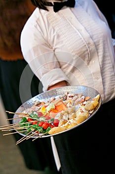 Server with appetizers