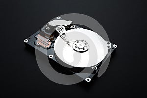 Server hard drive on a black background. Storage of personal data of users on the hdd