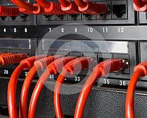 Server rack with red cables