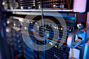 Server rack with supercomputer hardware in big data center inside closeup