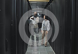 Server room, teamwork or people on laptop for software management, system upgrade or cyber security. Network technician