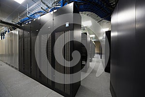 Server room with telecommunication racks photo