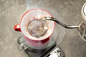 Serves coffee with a V60 dripper coffee maker photo