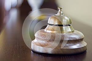 Service bell in a hotel reception for concierge alarm on desk.