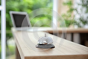 Service bell on reception desk in hotel