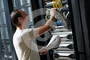 Service engineer in server room