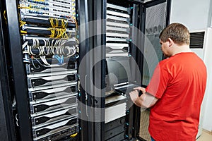 Service engineer in server room