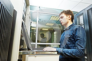 Service engineer in server room