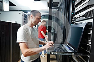 Service engineer in server room