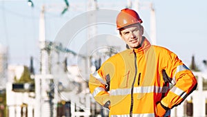 Service engineer standing near heat electropower station