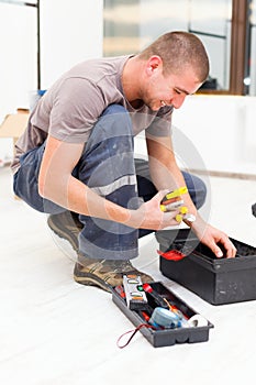 Service Man with His Toolbox