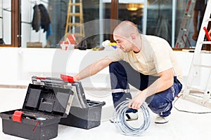 Service Man with His Toolbox