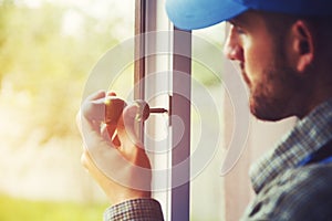 Service man installing window