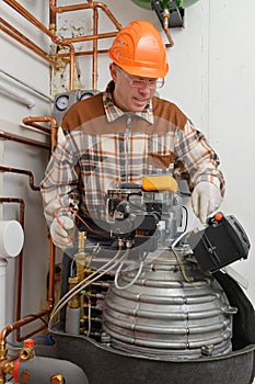 Service Man Working on Furnace