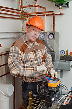 Service Man Working on Furnace