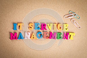 It Service Management. Text from colorful wooden letters