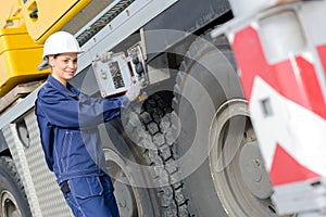 Service mechanic fixing heavy truck