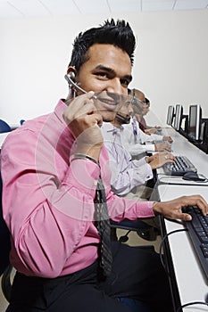 Service Operators Communicating On Headset photo