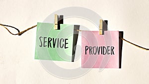 SERVICE PROVIDER text words inscription on yellow sticker note on white wall or table