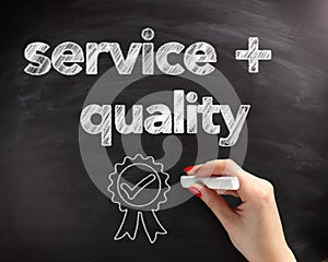 Service and Quality Text on Board with Ribbon