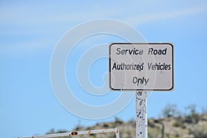 Service Road Authorized Vehicles Only Sign in Estrella Park. Goodyear, Maricopa County, Arizona USA