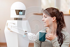 Service robot is giving a coffee