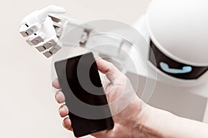 Service robot is reaching a smartphone