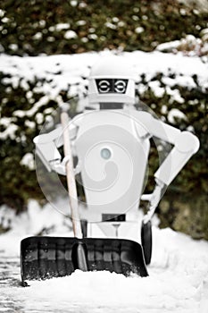Service robot is shovelling snow