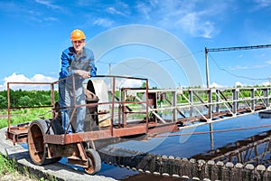 Service staff of water treatment plant on the work
